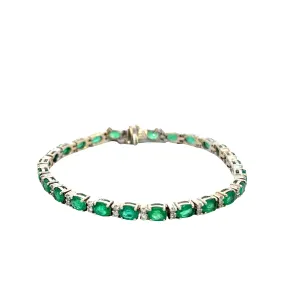 14KT White Gold Round Cut Diamond And Oval Emerald Bracelet